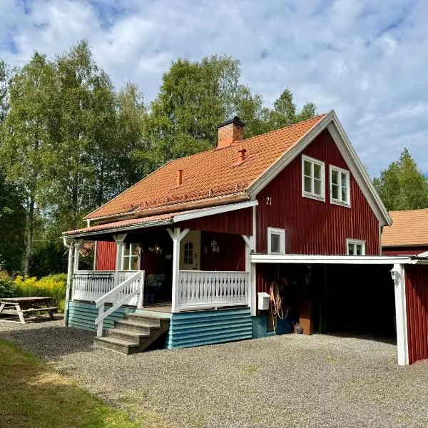 House near forest and water, hotel in Hagfors