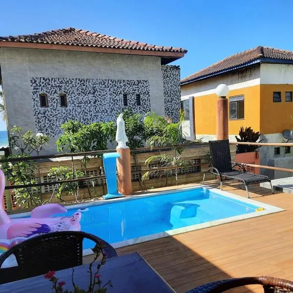 Chalé Pé na Areia e Piscina Privativa em Barra do Jacuípe, hotel in Camaçari