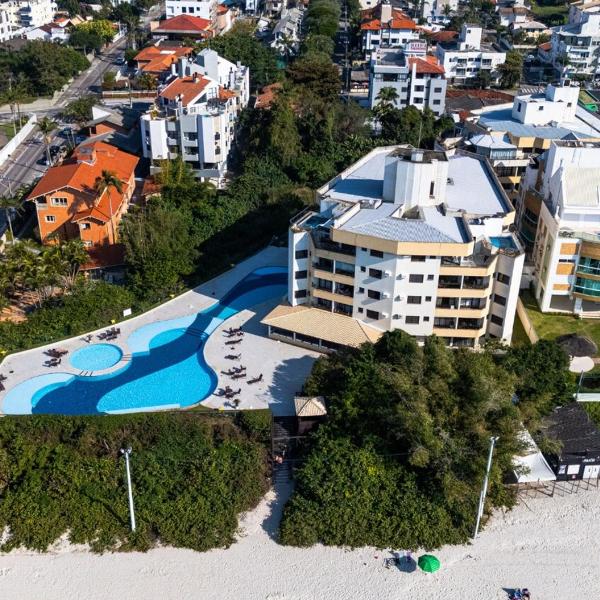 C125 Charmoso apartamento pé na areia de 1 quarto