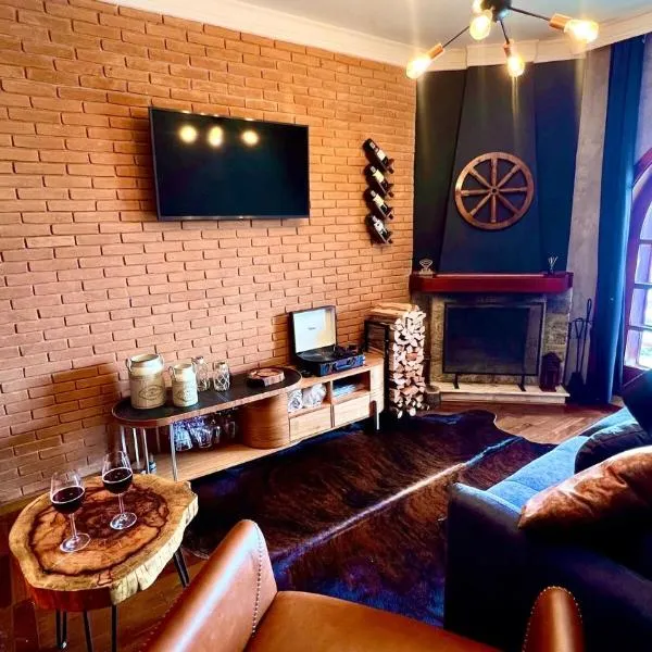 Boutique Flat com Banheira Lareira e Piscina Aquecida, hotel v destinácii Campos do Jordão