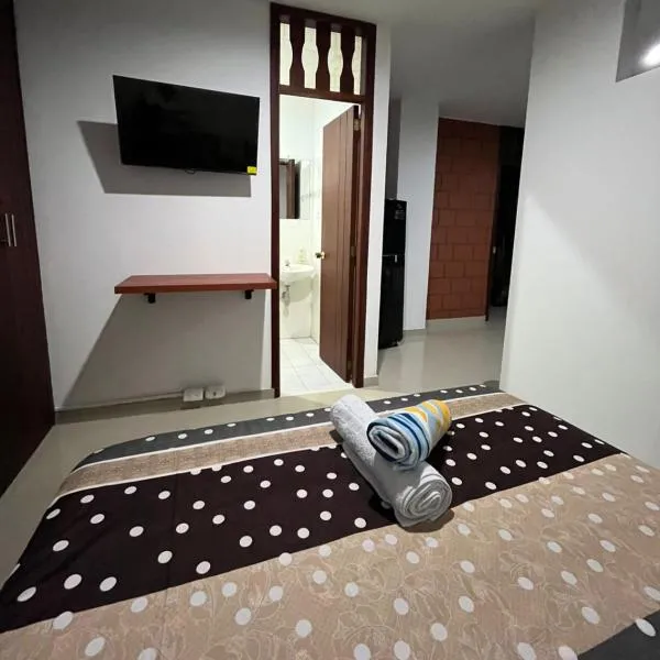 Tayra Living Suites, отель в городе Мокоа