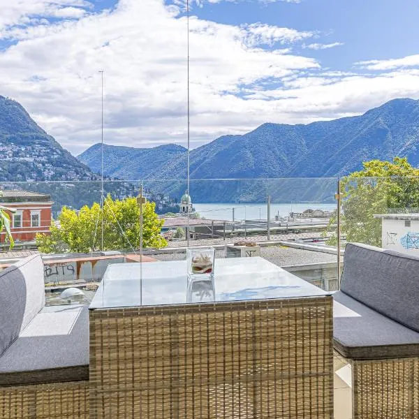 Imperial of Lugano 2 with a lake view and garden behind the station and 10 min from the lake of Lugano, hotel in Lugano