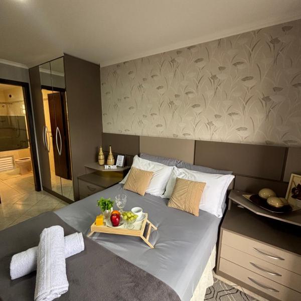 Casa Confortável 03 Quartos Com Suite, Churrasqueira, Banheira e Garagem