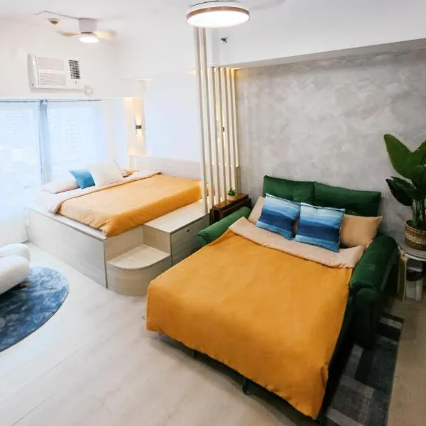 Breathtaking Eastwood City View, 3min walk to Malls, with Washer, Hotel in Manila