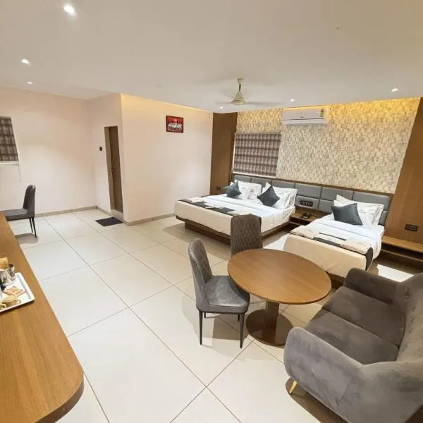 Hotel Sunrise Deluxe，浦那的飯店