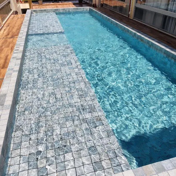 Ap c Piscina 400 m Rampa da Praia do Atalaia, hotel em Salinópolis