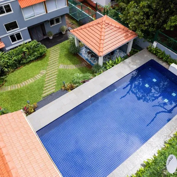 ELIVAAS 5 BHK with Pvt Pool, Entertainment Room & Glass House - Bludoor, hôtel à Marmagao