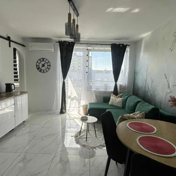 Piła- balkon-3 osoby-2 łóżka-przytulny apartament, hotel in Piła