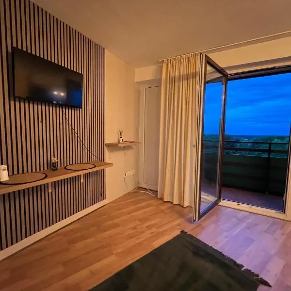 Viesnīca Apart-Hotelzimmer mit Bergblick in Bad Essen pilsētā Bādesene