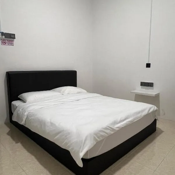 23 Inn Queenbed Room with share bathroom, hotel in Simpang Ampat