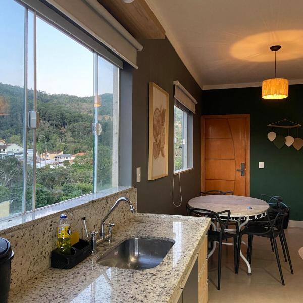 Duas Suites aconchegantes frente a Montanha - Foto 4