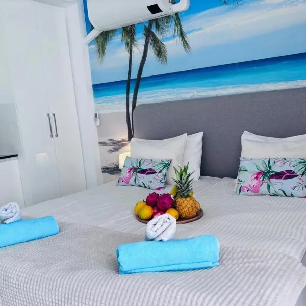 Under the palm, hotell Playa de las Americases