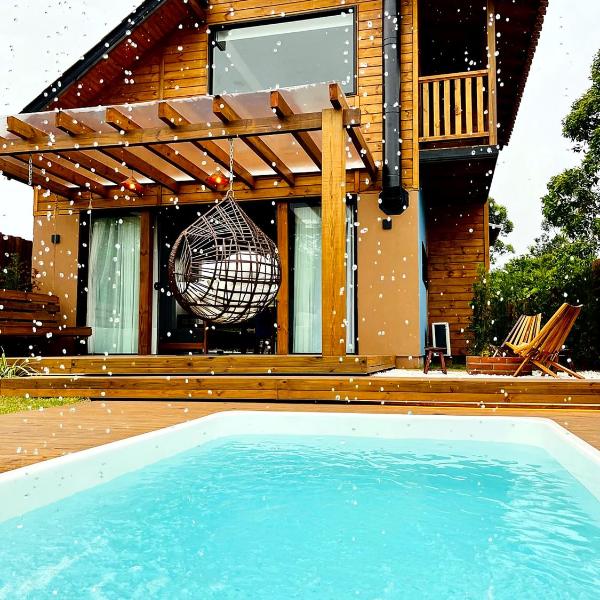 Casa com Banheira, Piscina e Quadra de Areia