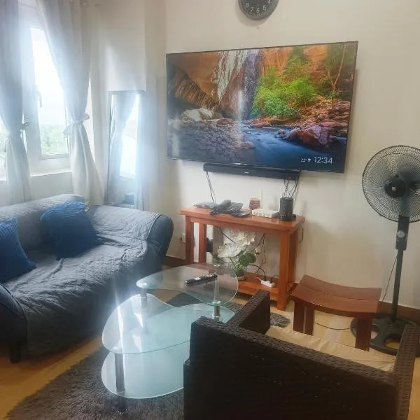 Happy Stays A - 300mbps - 65"TV NetFlix, Disney - Washer, hotel in Trece Martires