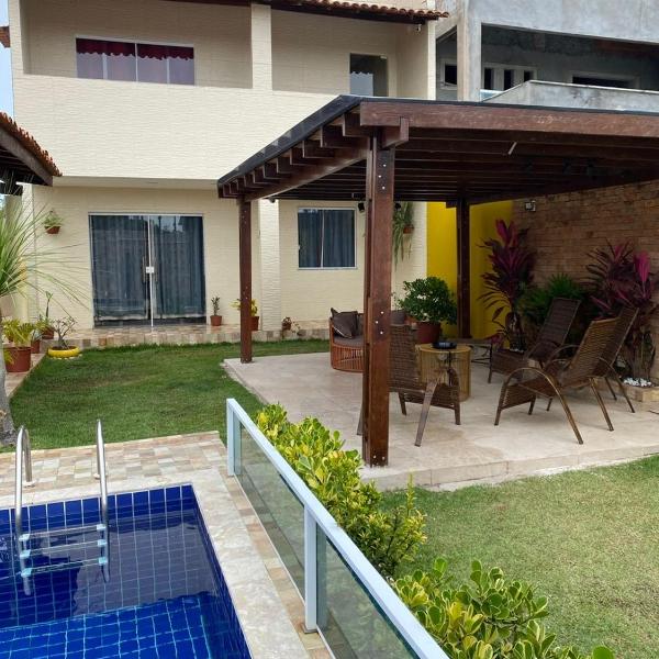 Casa de Praia com Piscina, Pergolado e Área Gourmet - Exclusividade e ConfortoArea