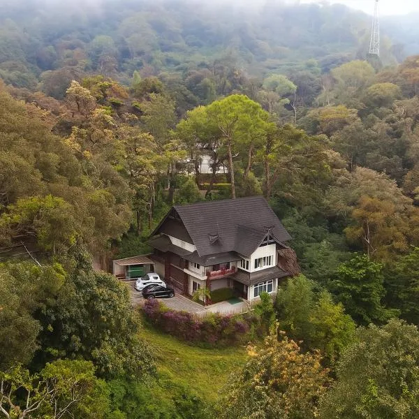 Nature Valley Farmhouse Resort by Raarees, Munnar #lap of nature #premium rooms #parking #Scenic view #garden with fireplace #property of the year, hotel in Munnar