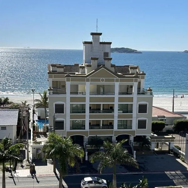 Golfinhos Apart hotel - apto térreo na praia com café da manhã!, hotel in Florianópolis