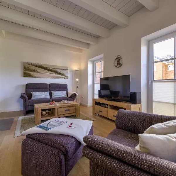 Haus Wind&Wellen, Wohnung Hafen, מלון בויטדון