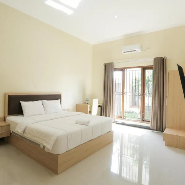 IDR Green Guest House Syariah Mitra RedDoorz, hotel in Solo
