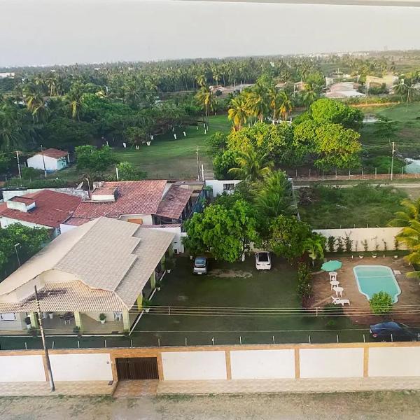 Casa de Praia com Ar, Piscina e Grande Área Verde