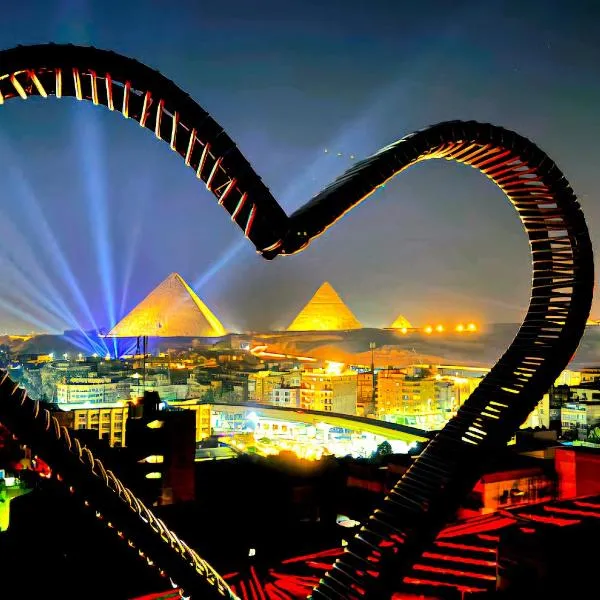 PYRAMIDS & SPHINX GEM HOTEL all apartments with Pyramids view, hôtel au Caire
