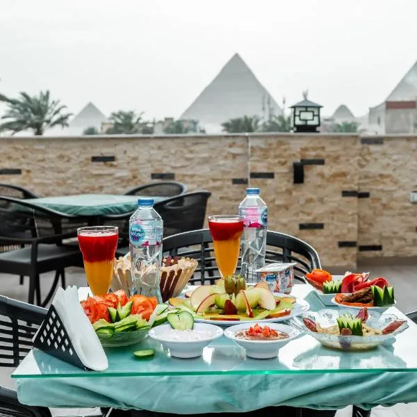 Night Pyramids Inn Hotel, hotel en El Cairo