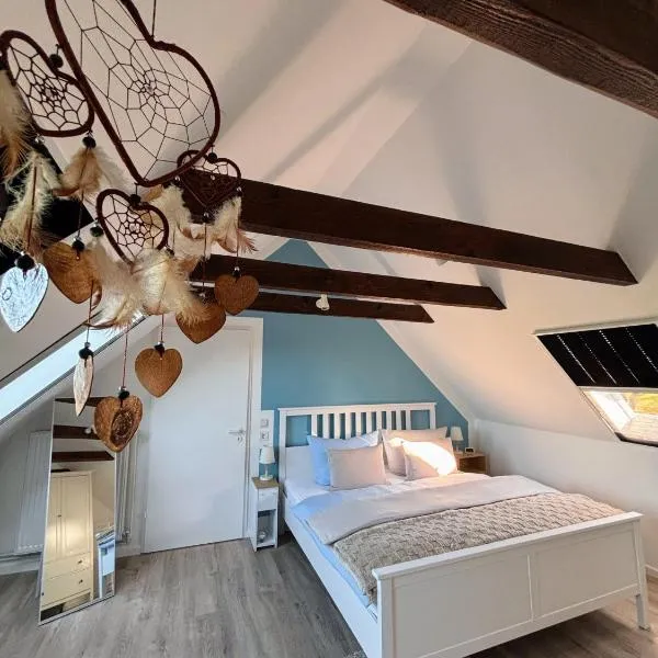 Lüttje Koje - Ferienhaus direkt am Deich und dem Meer dahinter, hotel en Norden