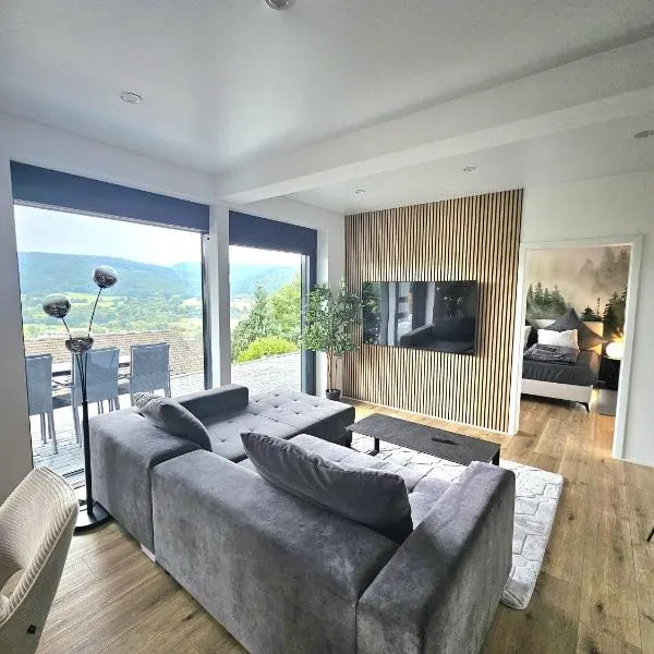 Moderne 3-Zimmer-Wohnung mit Panoramablick, hótel í Biedenkopf