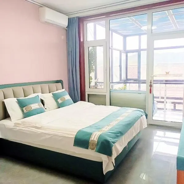 Jinshanling Great Wall聚友缘民宿, hotel di Gubeikou