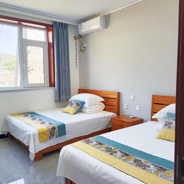 Jinshanling Great Wall聚友缘民宿, hotel en Gubeikou