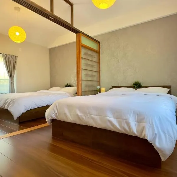 20 mins to KIX Izumisano Sta、泉佐野市のホテル