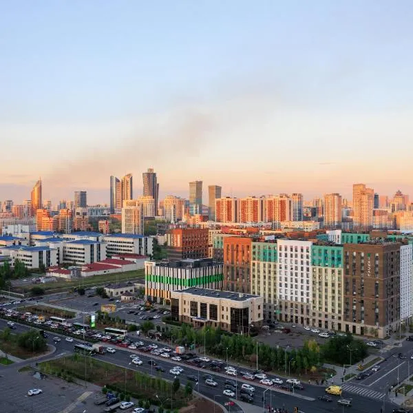 Апартаменты рядом с Хан-Шатыром, на левом берегу, hotel in Astana