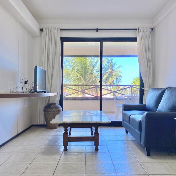 Apartamento em condomínio com acesso à praia