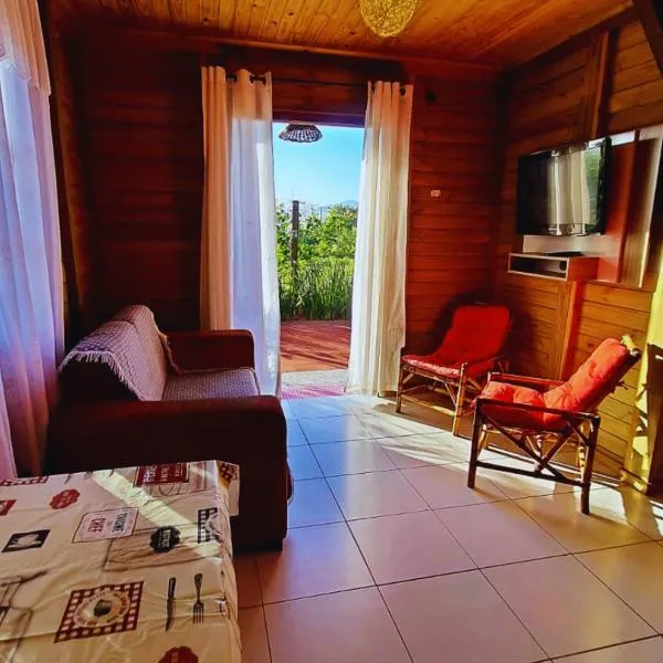 Hospedaria Chalés Rota Do Sol PDR - Hospedagem para casais, famílias e grupos, hotel in Praia do Rosa