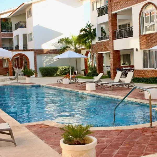 PASSION DEL CARIBE - CORAL VILLAGE 1 - modern and fully equipped apartments & suites in residence with pool and 24 hour security, close the beach, shops, bars, restaurants & entertainment，蓬塔卡納的飯店