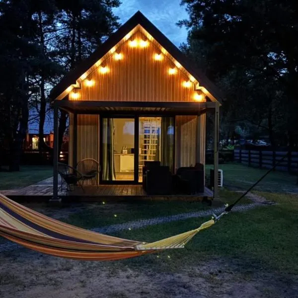 Osada pod Gwiazdami & SPA - DELUXE blisko jezioro, ogrodzony, ognisko, taras, dodatkowa sypialnia, hotel in Łasko