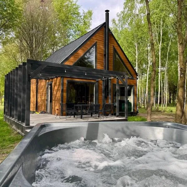Greenwood I - Dom z Jacuzzi i furtką do lasu、Tuliskaのホテル