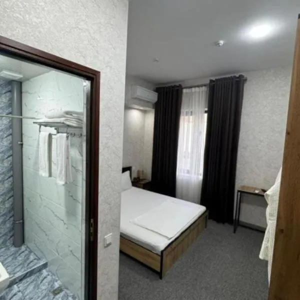 Azizbek INN Hotel White, hotel in Yakkasaray