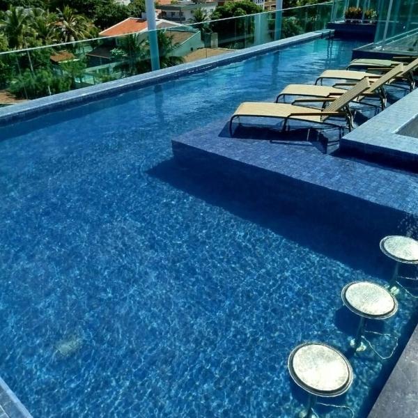 Beachfront flat Rooftop-Pool-Gym-Gourmet area