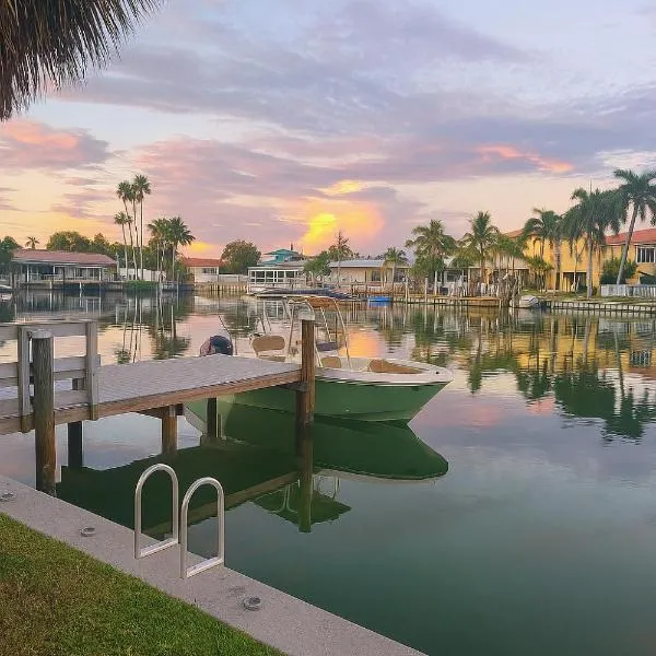 Oasis Waterfront Treasure Island Condo with Patio Dock and Johns Pass, Hotel in St. Pete Beach