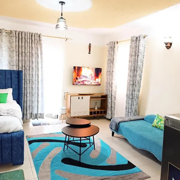 Homely Studio with free parking Balcony & Office desk, hôtel à Kisumu