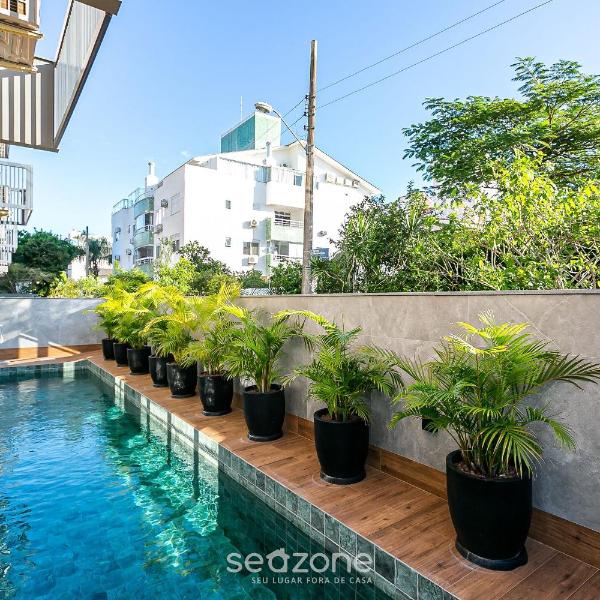 Ap c/ churrasq e piscina 350m praia Jurerê JPR201