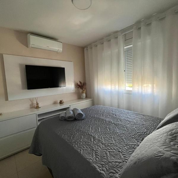 Apartamento suíte com estacionamento