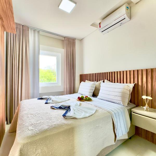 Casa Completa com Churrasqueira Wi-Fi e Garagem para 2 Carros a 400m da PRAIA Acomoda 8 Pessoas, 3 suites com Ar-Condicionado - Foto 2