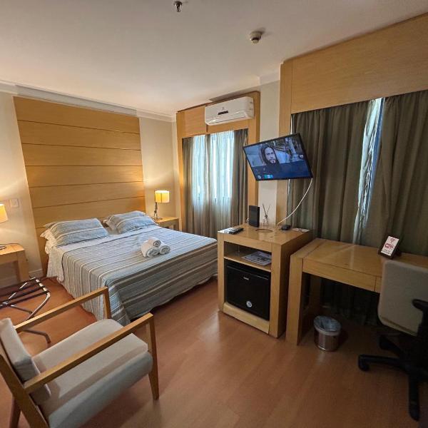 Hotel E suites em frente ao Aeroporto com ar e piscina 1703