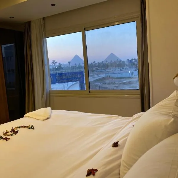 New Galleria Pyramids view inn, hotel in Caïro