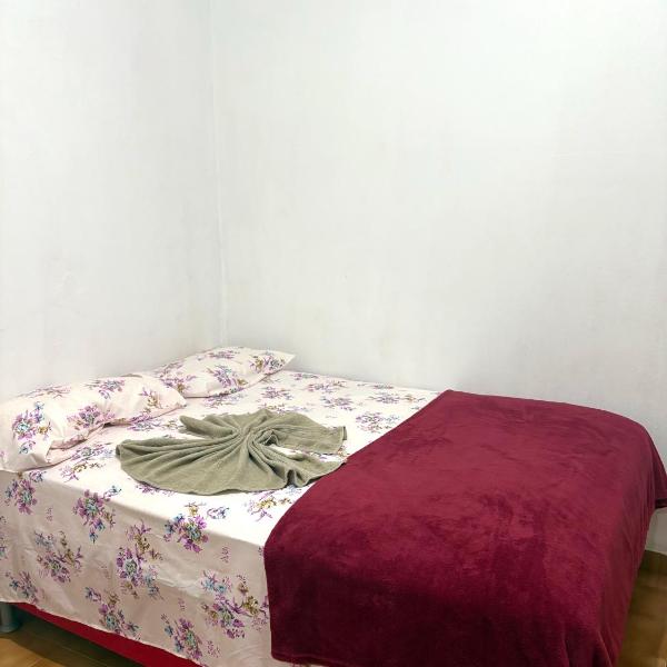 Quarto no centro 309