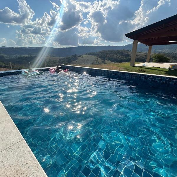 Refúgio na montanha com piscina aquecida em Extrema