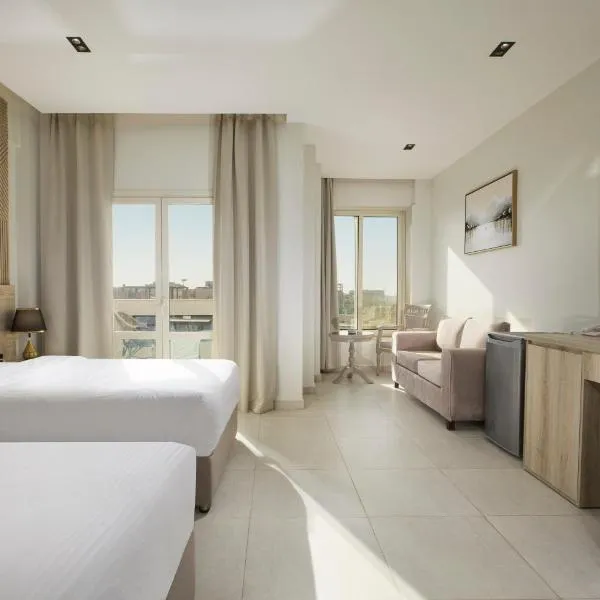 Rivana Residence New Cairo - Pool & GYM Access, hotel en El Cairo