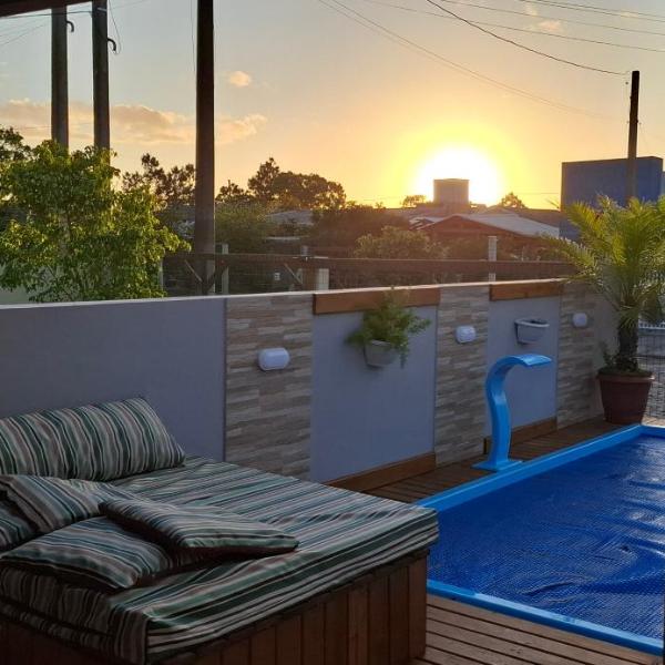 Casa aconchegante com piscina em Nova Tramandai, até 6 hospédes, não aceitamos pets